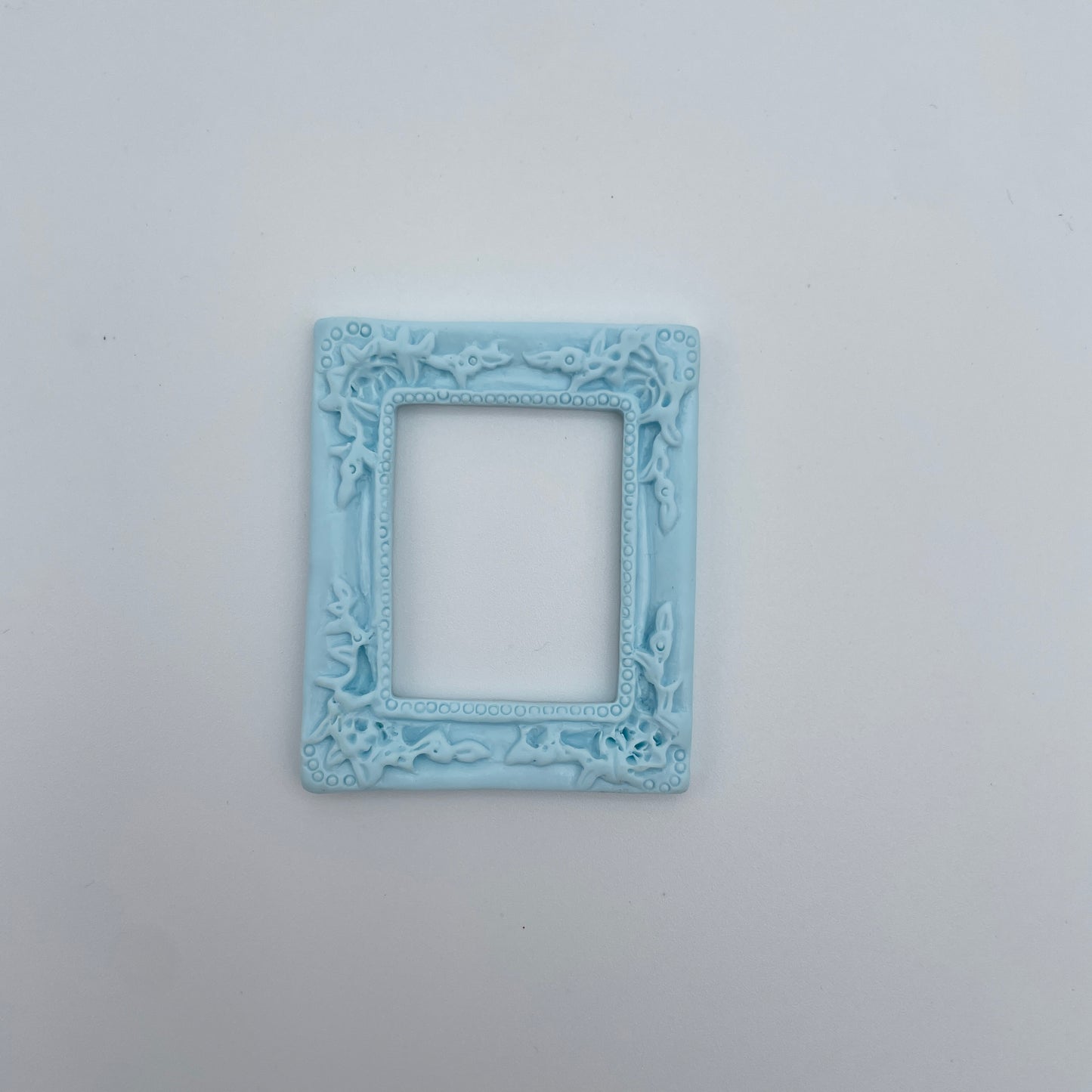 Miniature rammer i pastelfaer