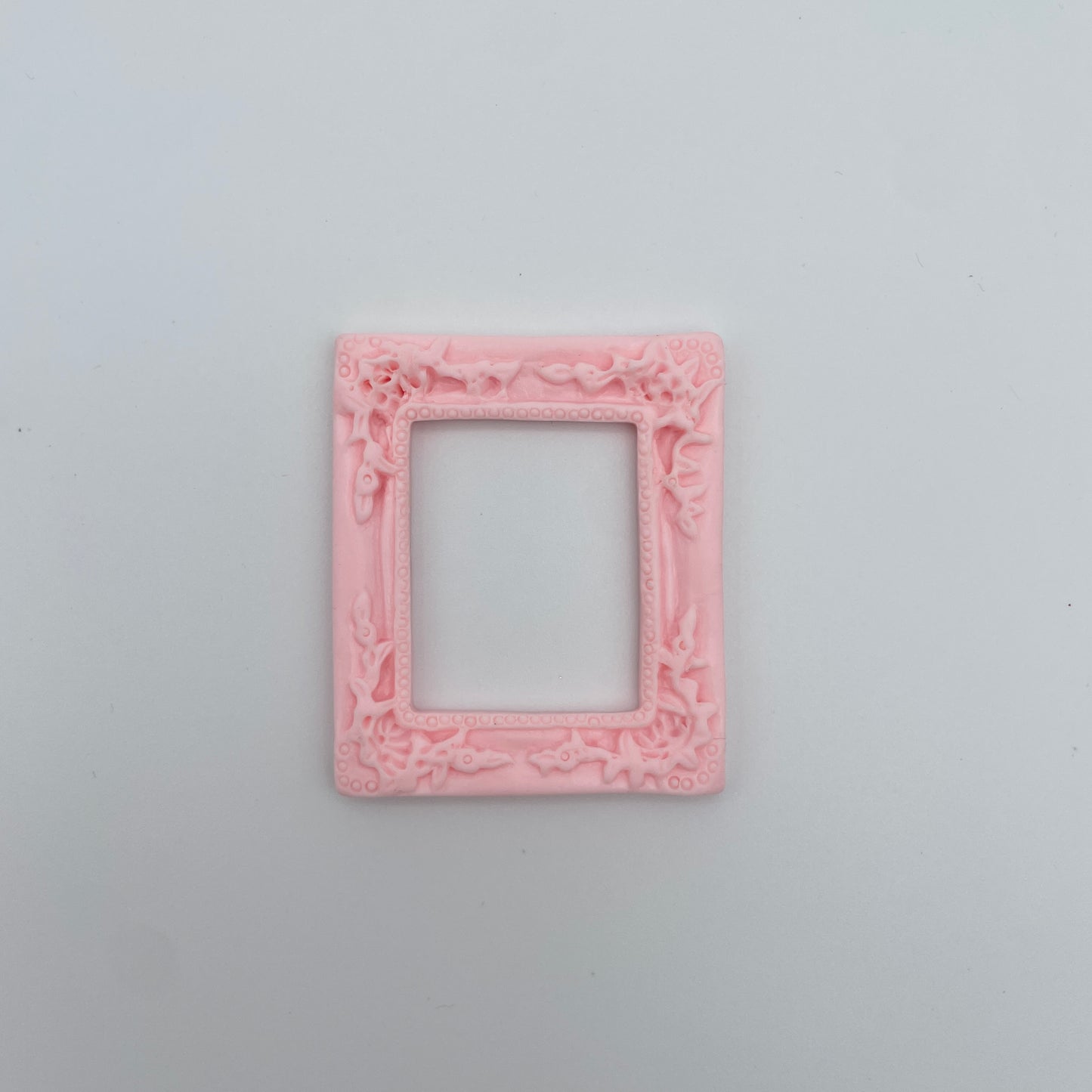 Miniature rammer i pastelfaer