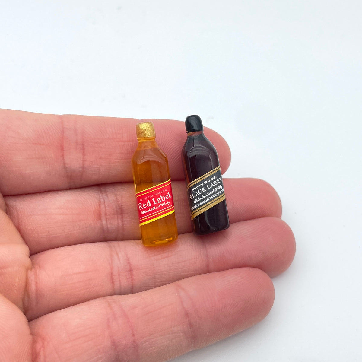 Miniature sprutflasker