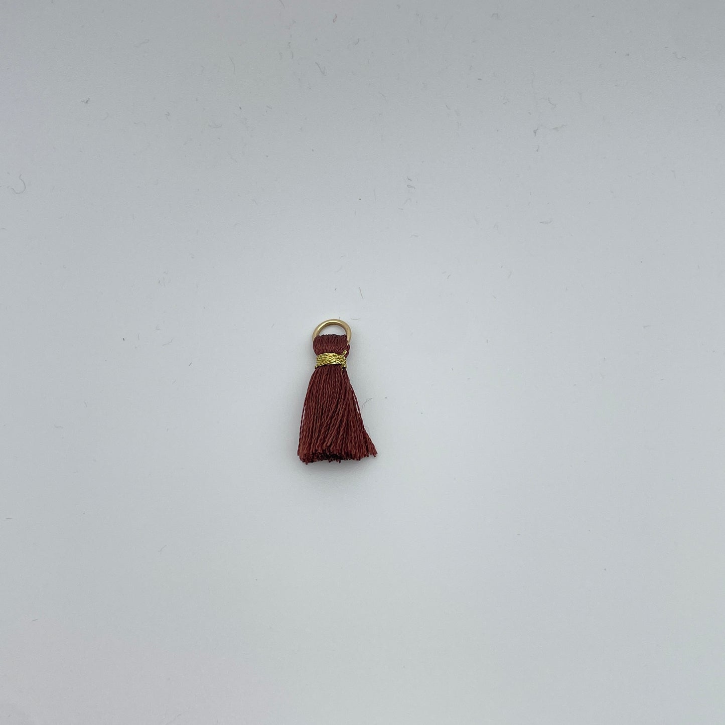 Minikvaster (med guld tråd)