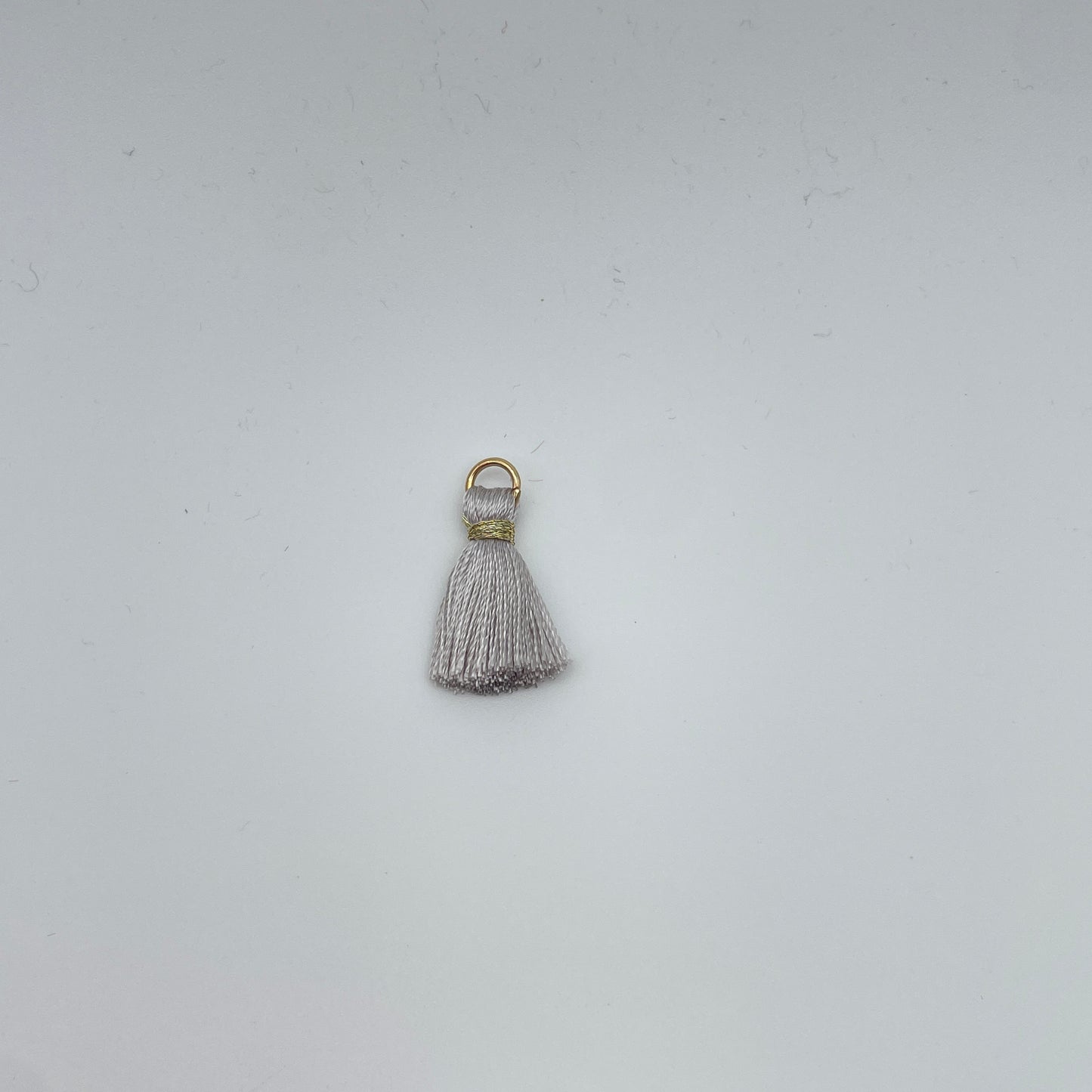 Minikvaster (med guld tråd)
