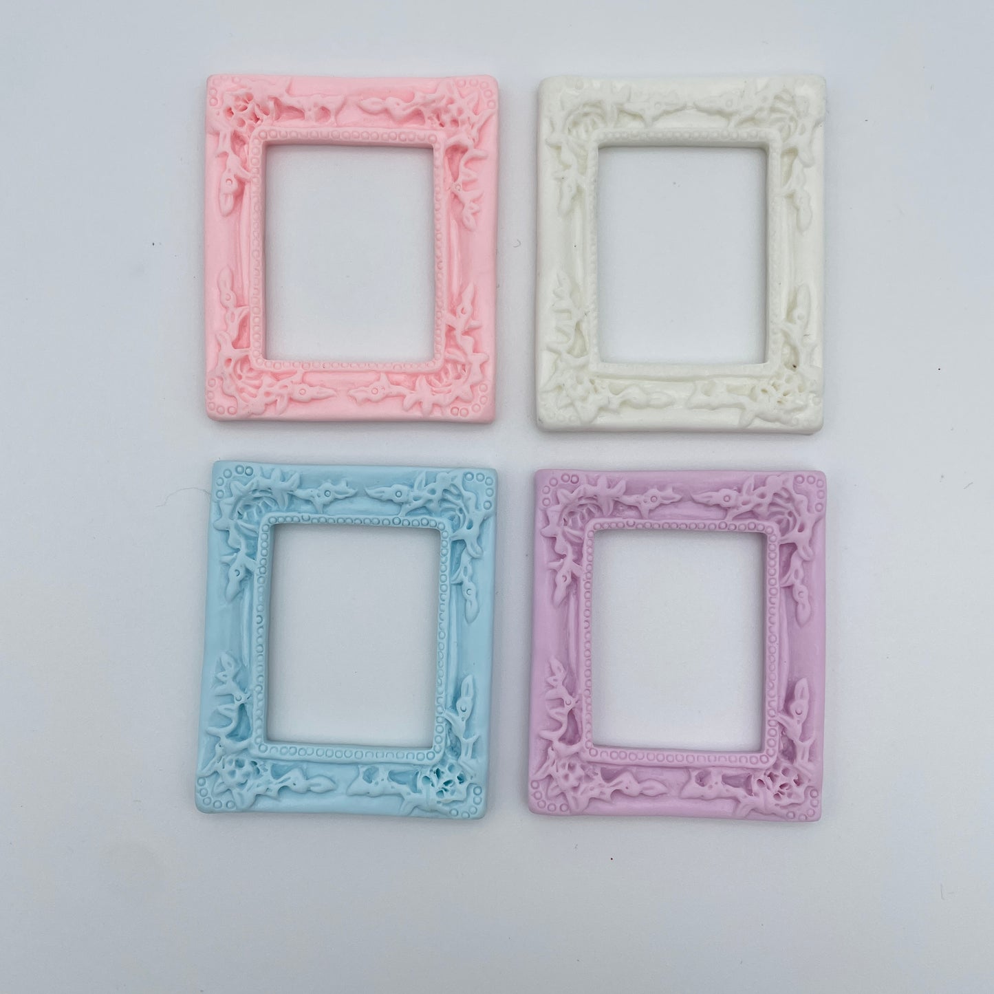 Miniature rammer i pastelfaer