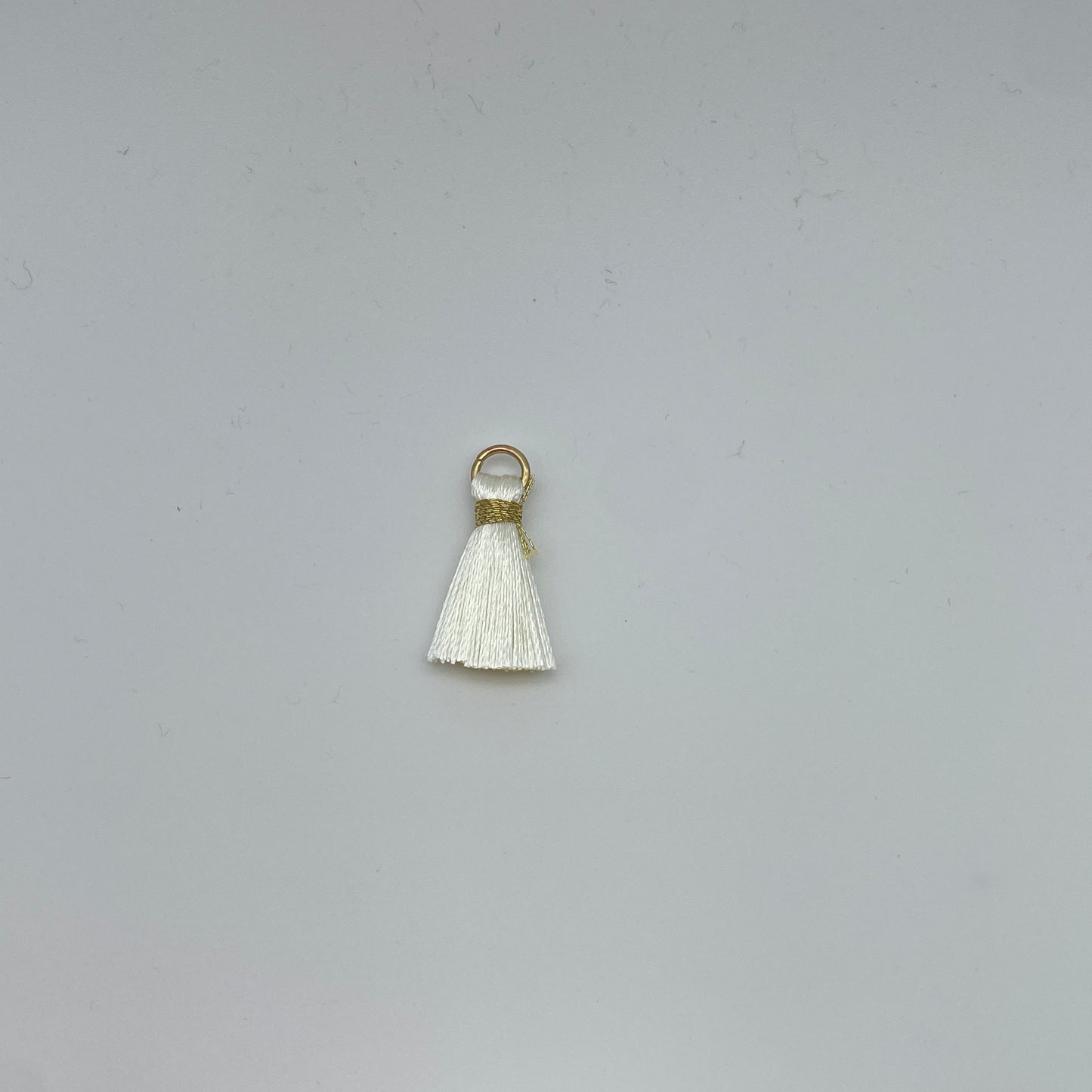 Minikvaster (med guld tråd)