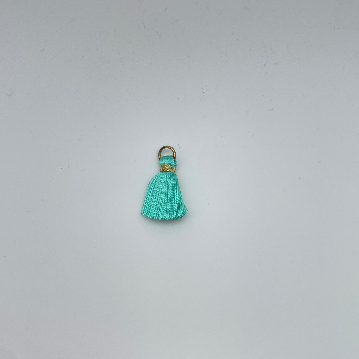 Minikvaster (med guld tråd)